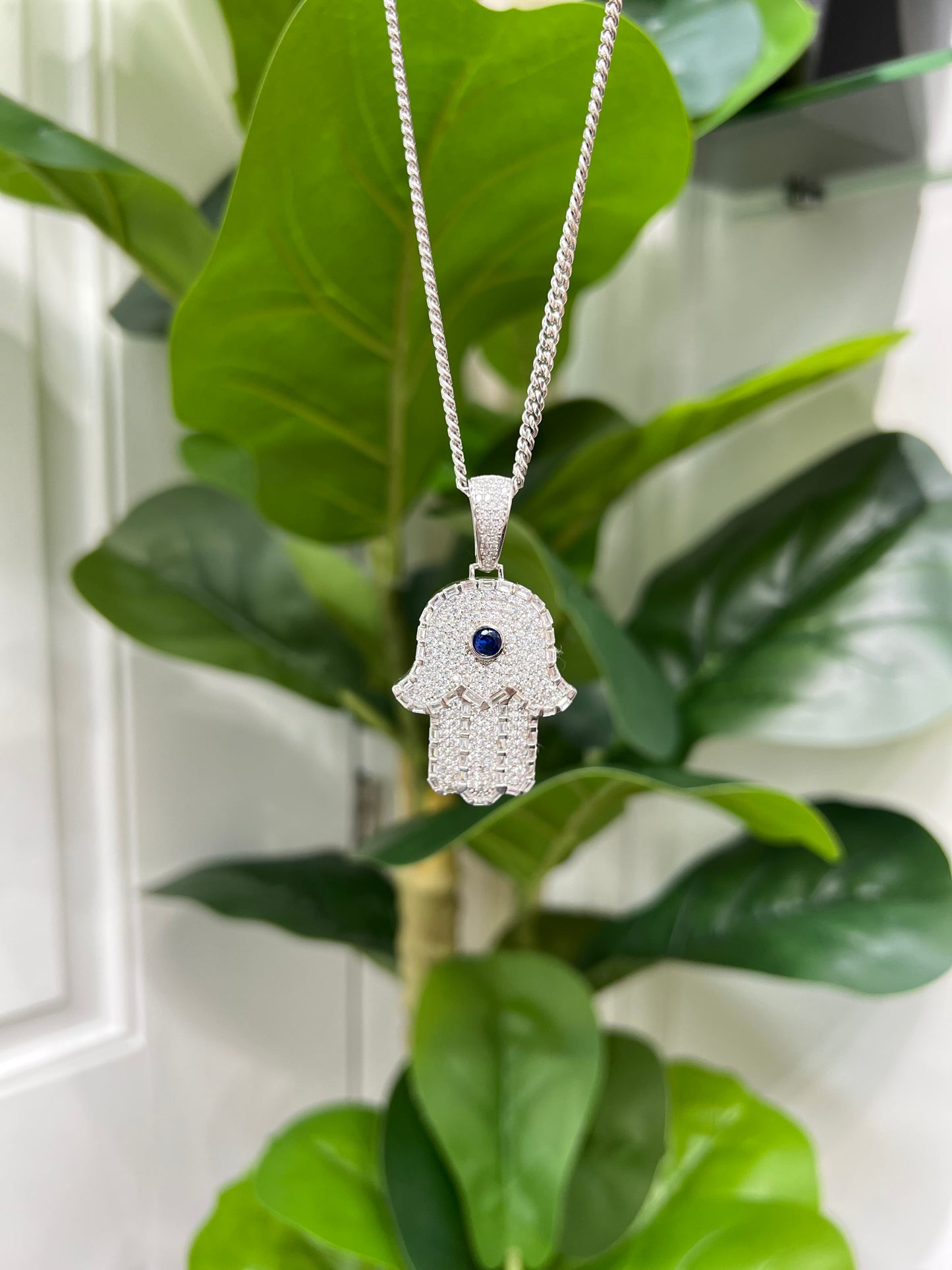 S421- .925 Sterling Silver Blue Full CZ Hamsa Hand Pendant W.G