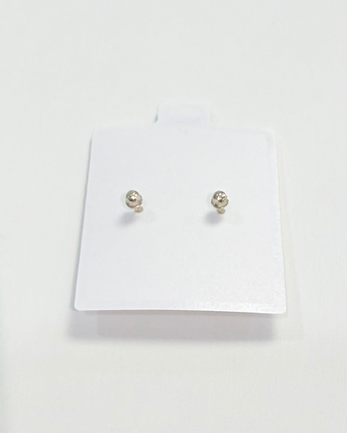 1691- NEW 10K Zirconia Stud Earrings (2mm) W.G