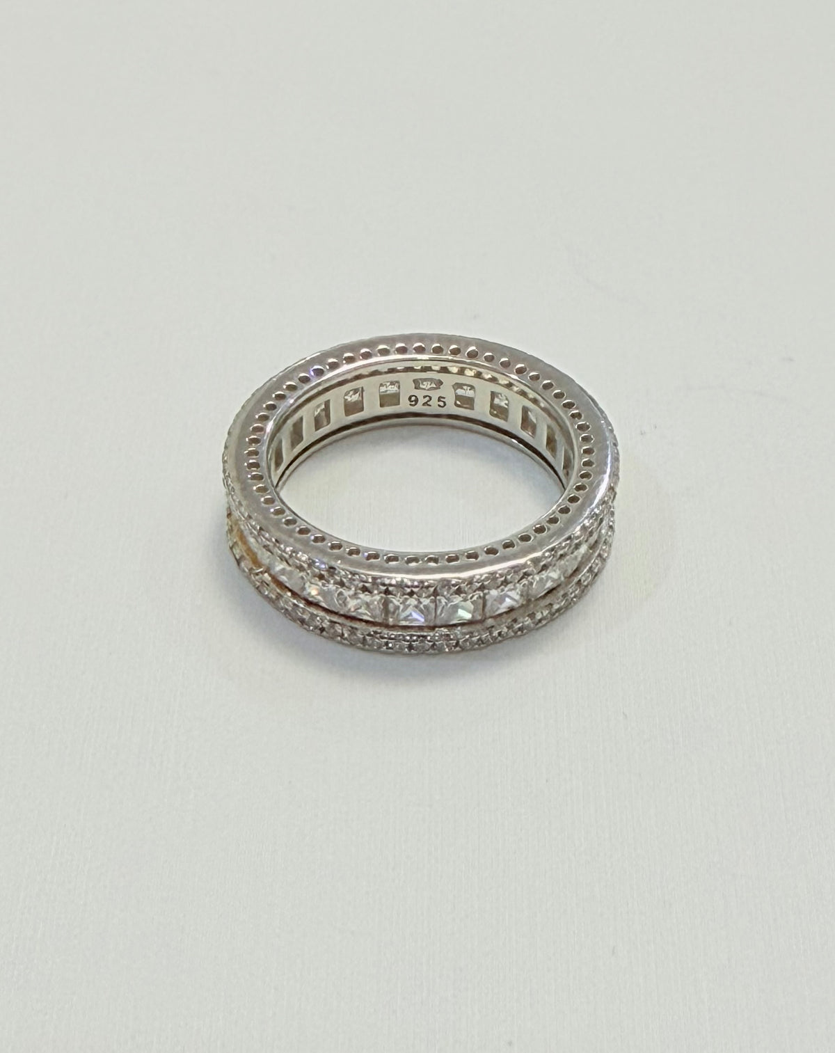 S559- .925 Sterling Silver Band Cz Stones W.G