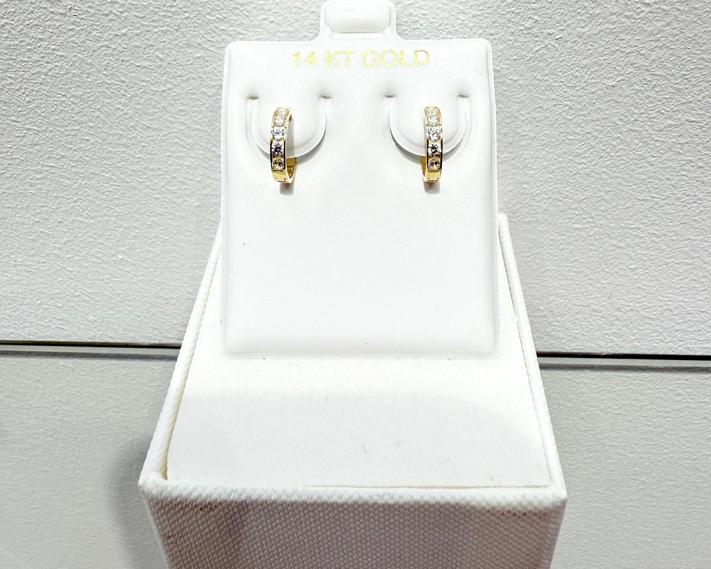 1091- NEW 14K Clear CZ Huggie Hoop Earrings (2x10mm) W.G