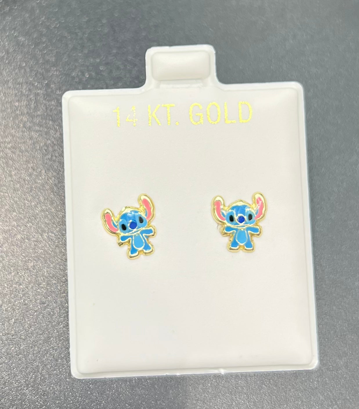1141- NEW 14K Small Stitch Stud Earrings W.G