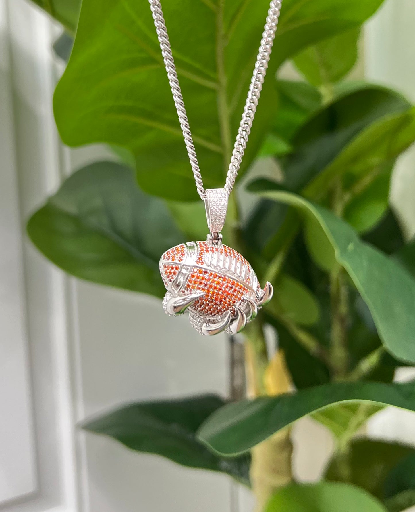 S407- NEW .925 Sterling Silver Claw Football Pendant W.G