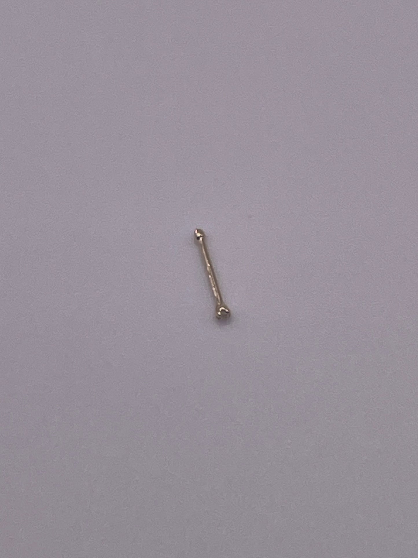 658- New 14K Gold Nose Stud (1mm) W.G