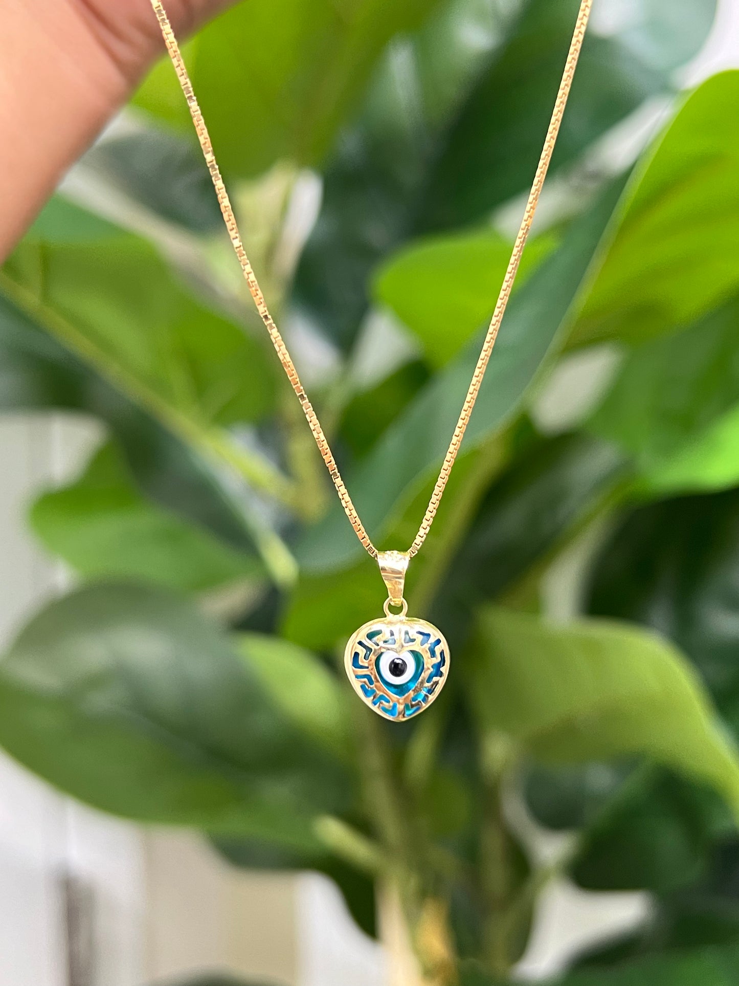 00206 - Colgante de corazón con ojo malvado de 14 quilates