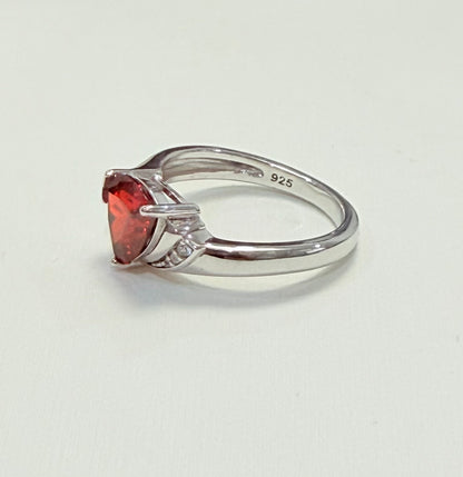 S558- .925 Sterling Silver Elegant Trillion Garnet Cz Ring W.G