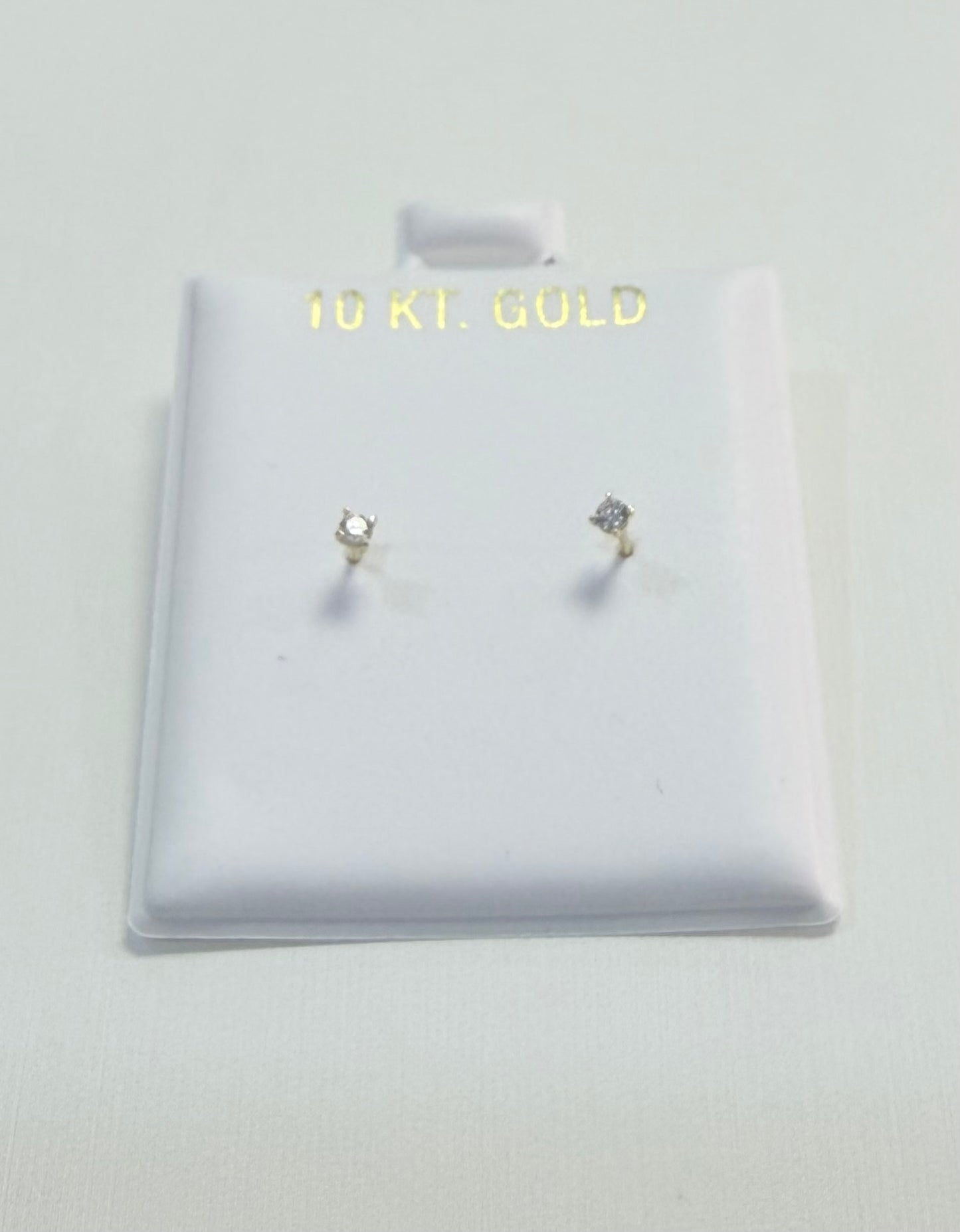 1691- NEW 10K Zirconia Stud Earrings (2mm) W.G