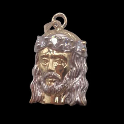 00193-Colgante mediano con cara de Jesús de 14 quilates