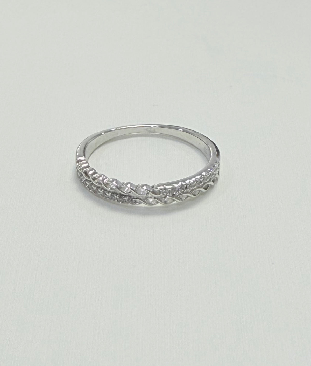S446- NEW .925 Sterling Silver Micro Eternity CZ Ring W.G