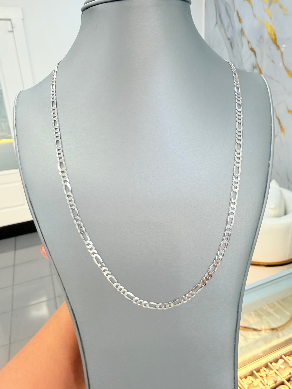 S917- .925 Sterling Silver Figaro Chain 22” (4.4mm) W.G