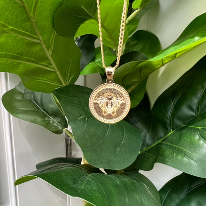 1310- NEW 10K Medusa Round Pendant W.G