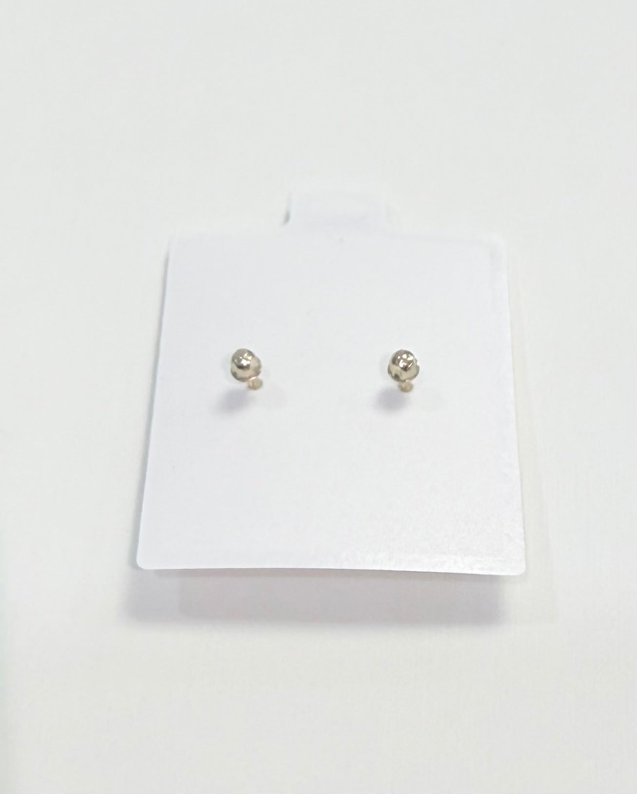 1691- NEW 10K Zirconia Stud Earrings (2mm) W.G