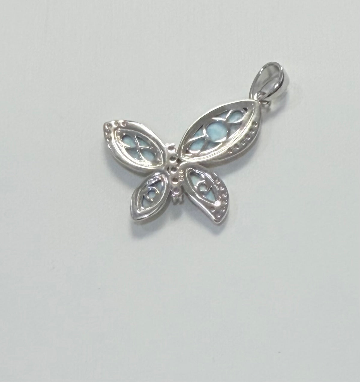 S906- .925 Sterling Silver Larimar Butterfly Pendant W.G