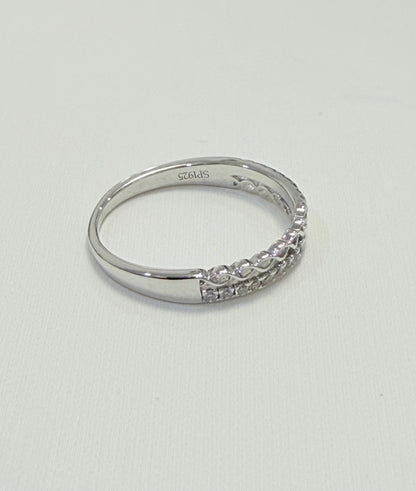 S446- NEW .925 Sterling Silver Micro Eternity CZ Ring W.G