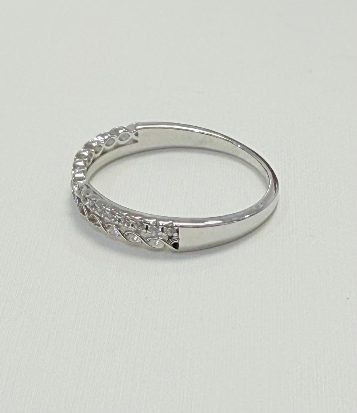 S446- NEW .925 Sterling Silver Micro Eternity CZ Ring W.G