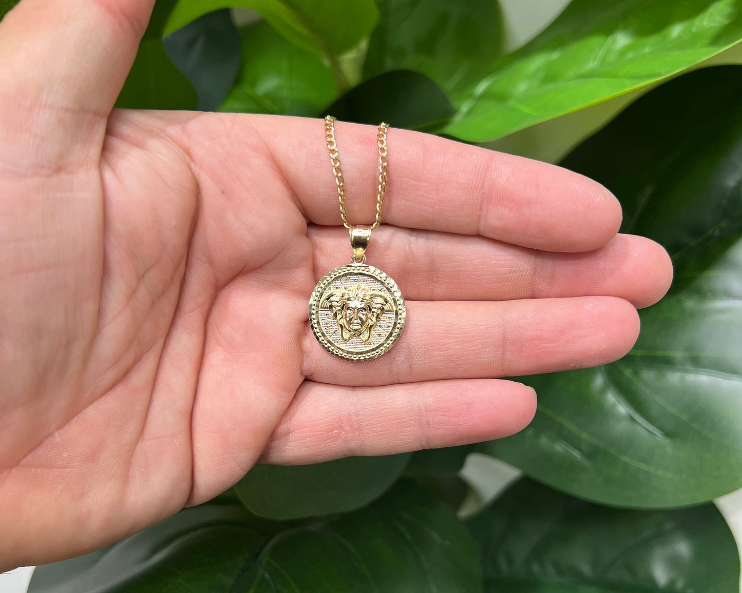 1310- NEW 10K Medusa Round Pendant W.G