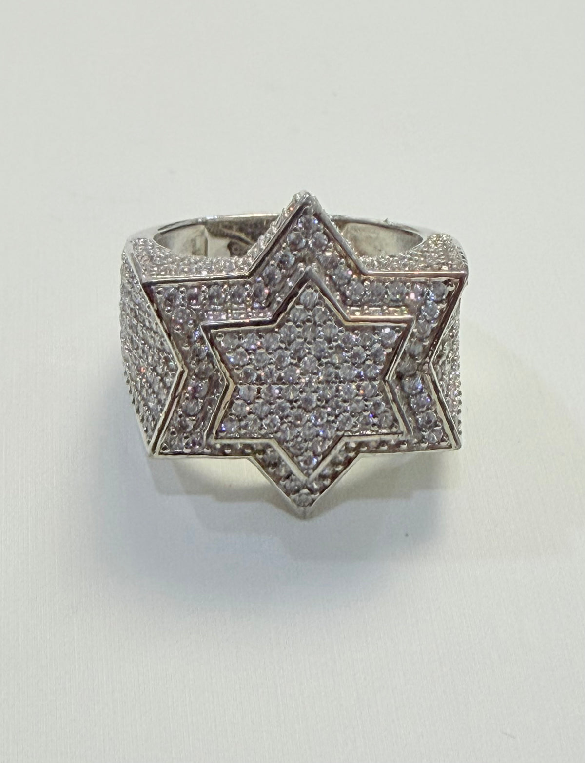S396- 925 Sterling Silver Star CZ Ring W.G