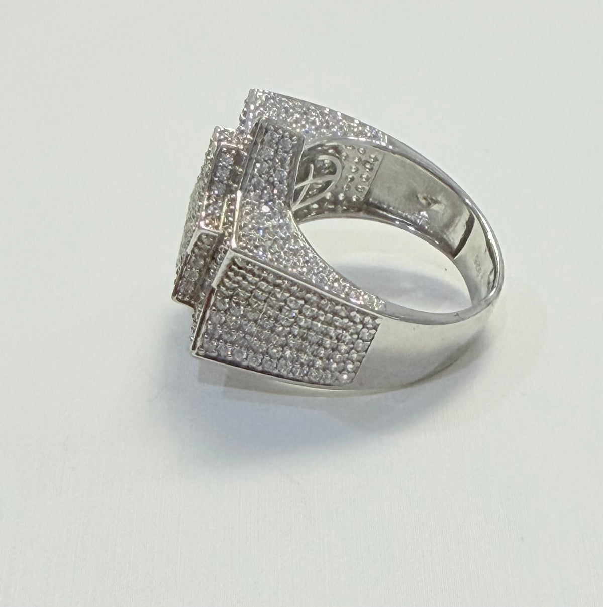 S396- 925 Sterling Silver Star CZ Ring W.G