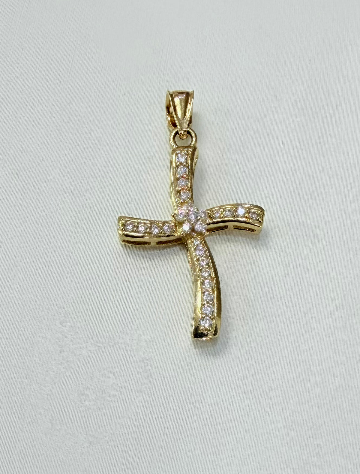 1729- NEW 10K Gold Curved Cross Pendant W.G