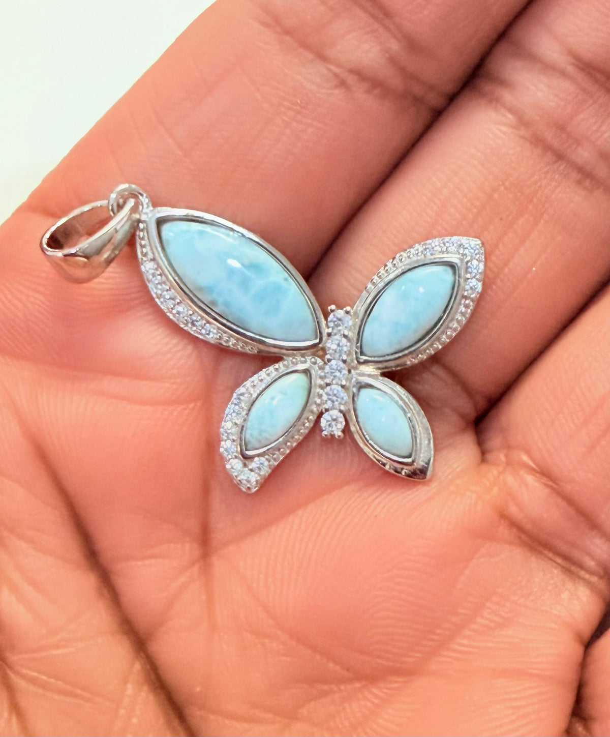 S906- .925 Sterling Silver Larimar Butterfly Pendant W.G