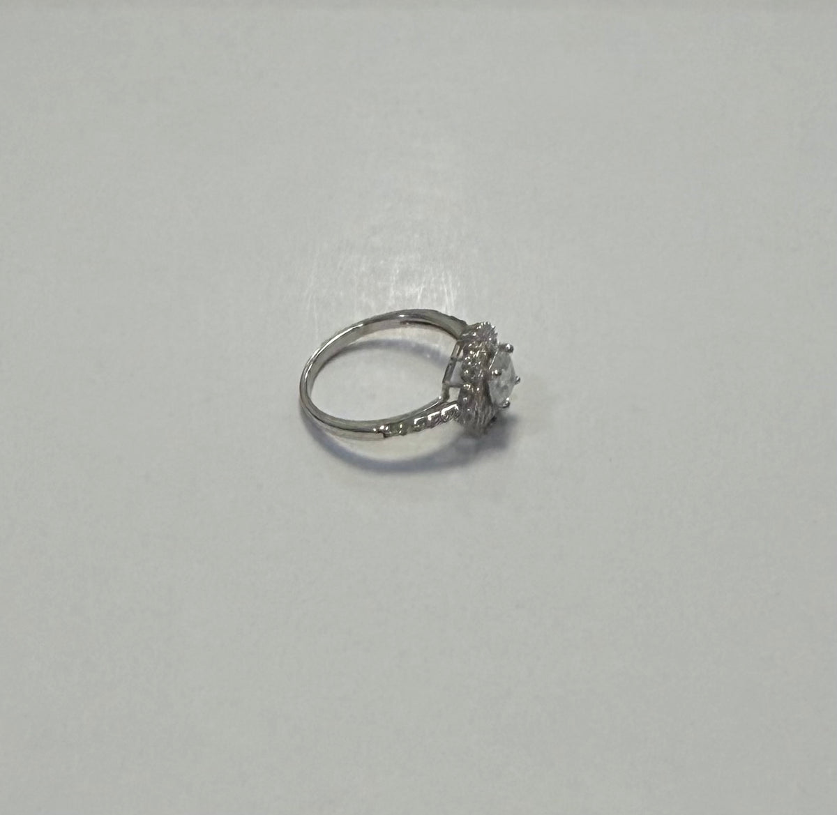 S1141- .925 Sterling Silver Flower Moissanite Ring W.G