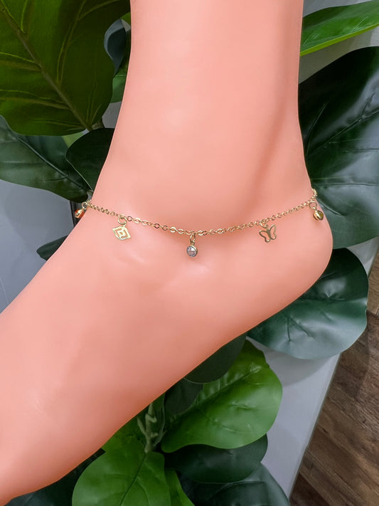 1157- NEW 14K Dangling Assorted Charms Anklet Bracelet 10” (1.8mm) W.G