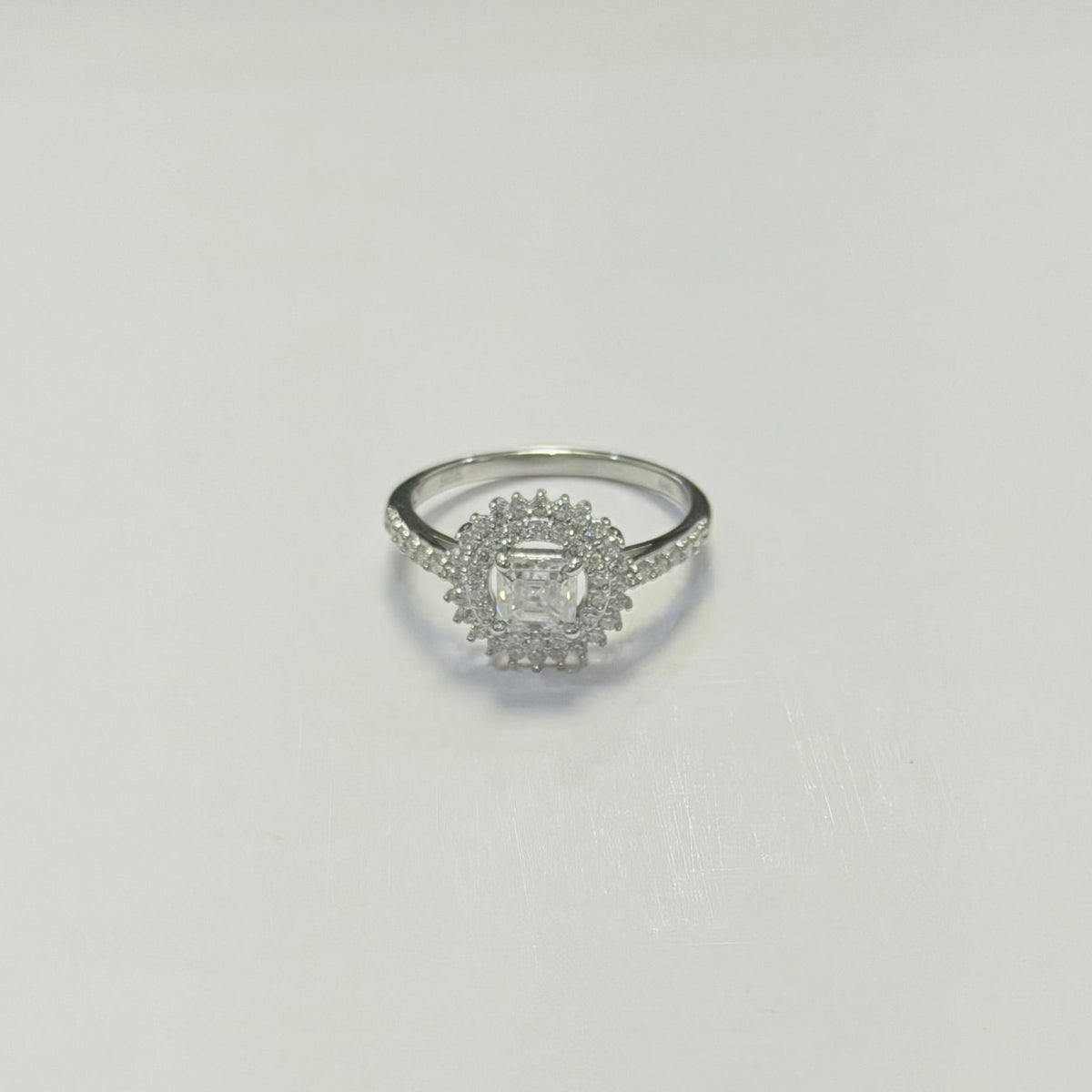 S1141- .925 Sterling Silver Flower Moissanite Ring W.G
